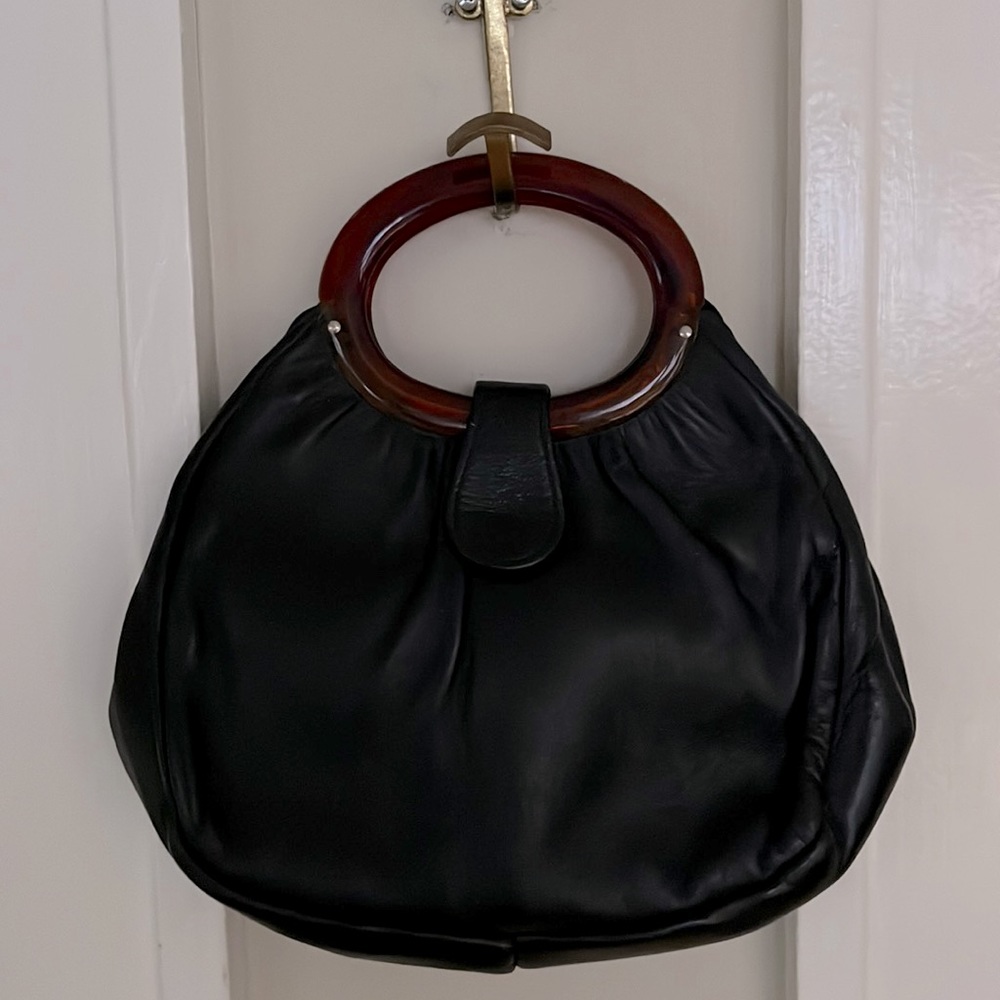 Women’s vintage leather bag lucite handles